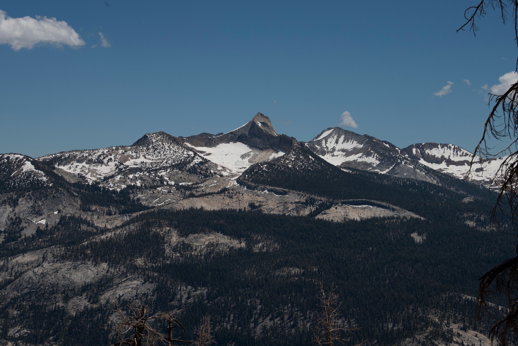 Several peaks and valleys are visible along the route of the trail leading to Cloud’s Rest July 13, 2019, at Yosemite National Park, California. Nearly four dozen Airmen from Travis Air Force Base, California, hiked to Cloud’s Rest covering 14.57 miles as they climbed to 9,926 feet above sea level. The hike was organized to enhance the Airmen’s physical, mental and spiritual resiliency. (U.S. Air Fore photo by Tech. Sgt. James Hodgman)