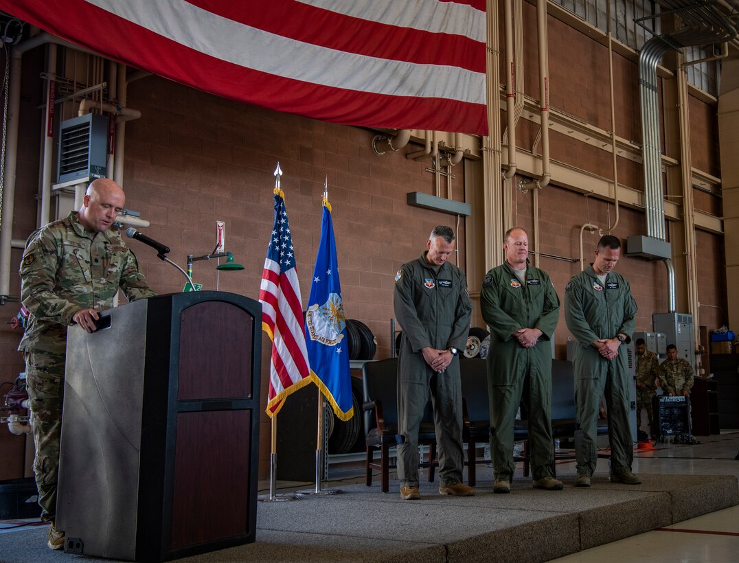 Lt. Col. Jason M. Botts, 412 Test Wing chaplain, Edwards Air Force Base, California, delivers the invocation at the 53rd Test and Evaluation Group (TEG) change of command ceremony at Nellis AFB, Jul. 10, 2019. The 53rd TEG is made up of seven squadrons, two direct-reporting detachments, two combined test forces, and one operations location at eight stateside locations. (U.S. Air Force photo by Airman 1st Class Dwane R. Young)
