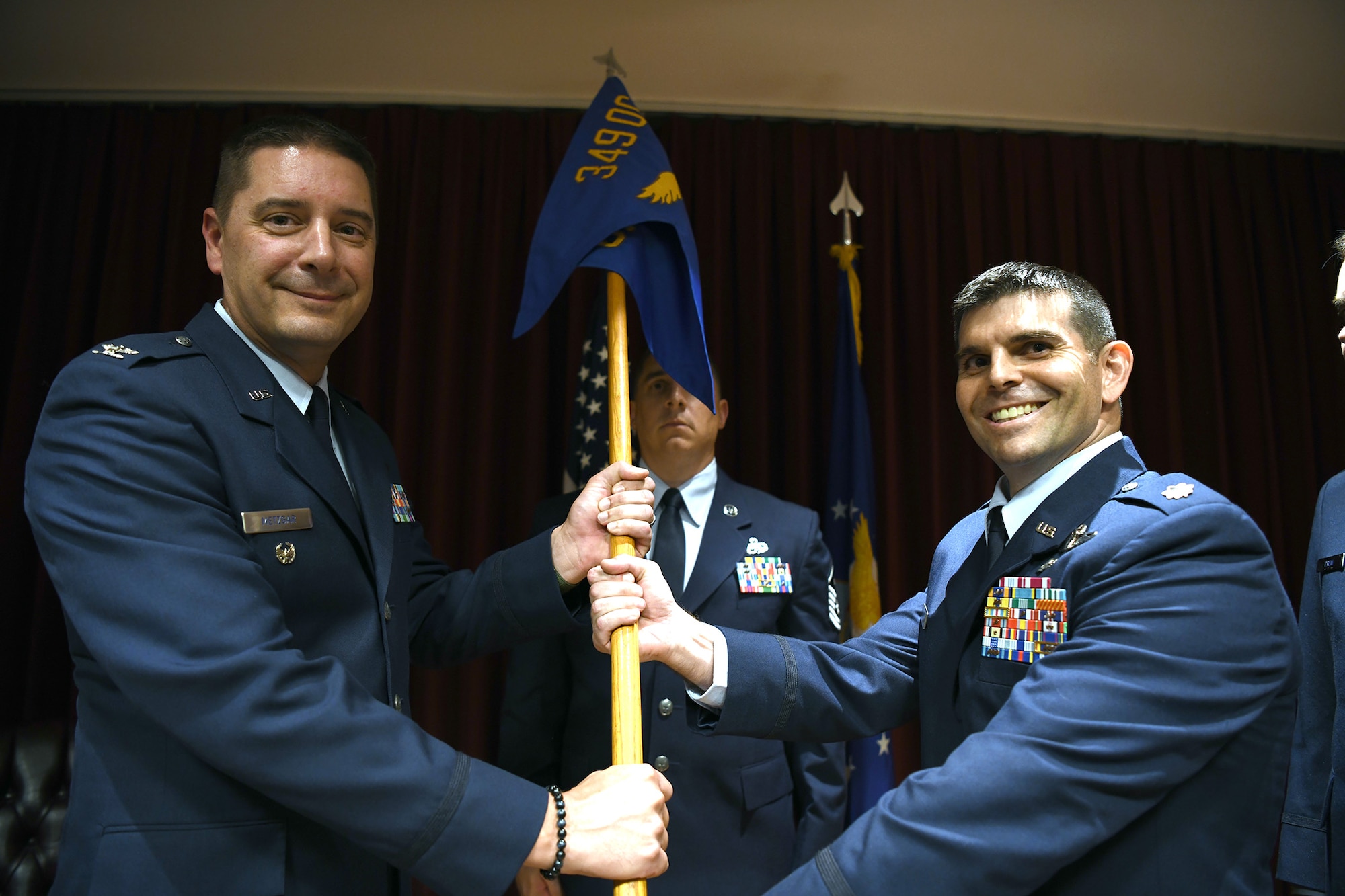 Here at Travis Air Force Base, Calif., July 13, 2019, Lt. Col. Michael L. Drew passed command of the 349th OSS to Lt. Col. Andrew H. Black.