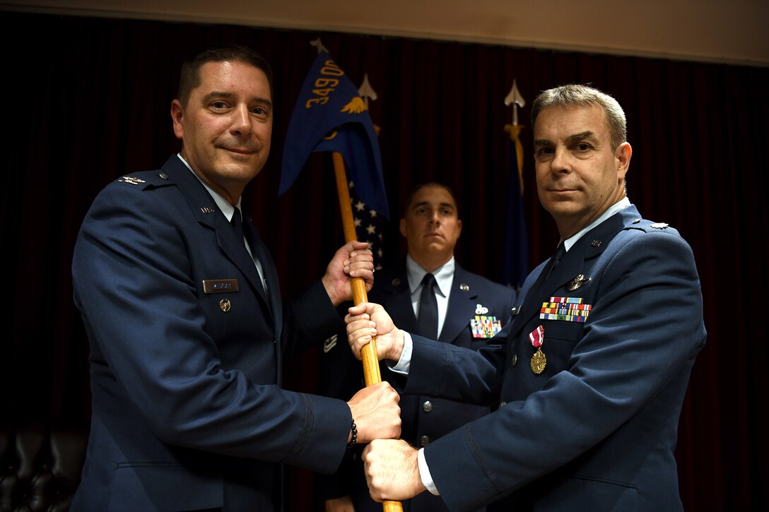 Here at Travis Air Force Base, Calif., July 13, 2019, Lt. Col. Michael L. Drew passed command of the 349th OSS to Lt. Col. Andrew H. Black.