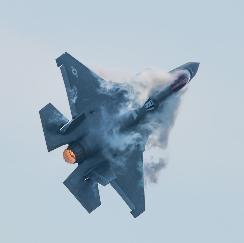 Capt. Andrew “Dojo” Olson, F-35 Demonstration Team pilot and commander performs a high-speed pass in an F-35A Lightning II during the Arctic Lightning Airshow July 13, 2019, at Eielson Air Force Base, Alaska. The aerial demonstration consists of 16 maneuvers that fully showcase the capabilities of the F-35A Lightning II. (U.S. Air Force photo by Senior Airman Alexander Cook)
