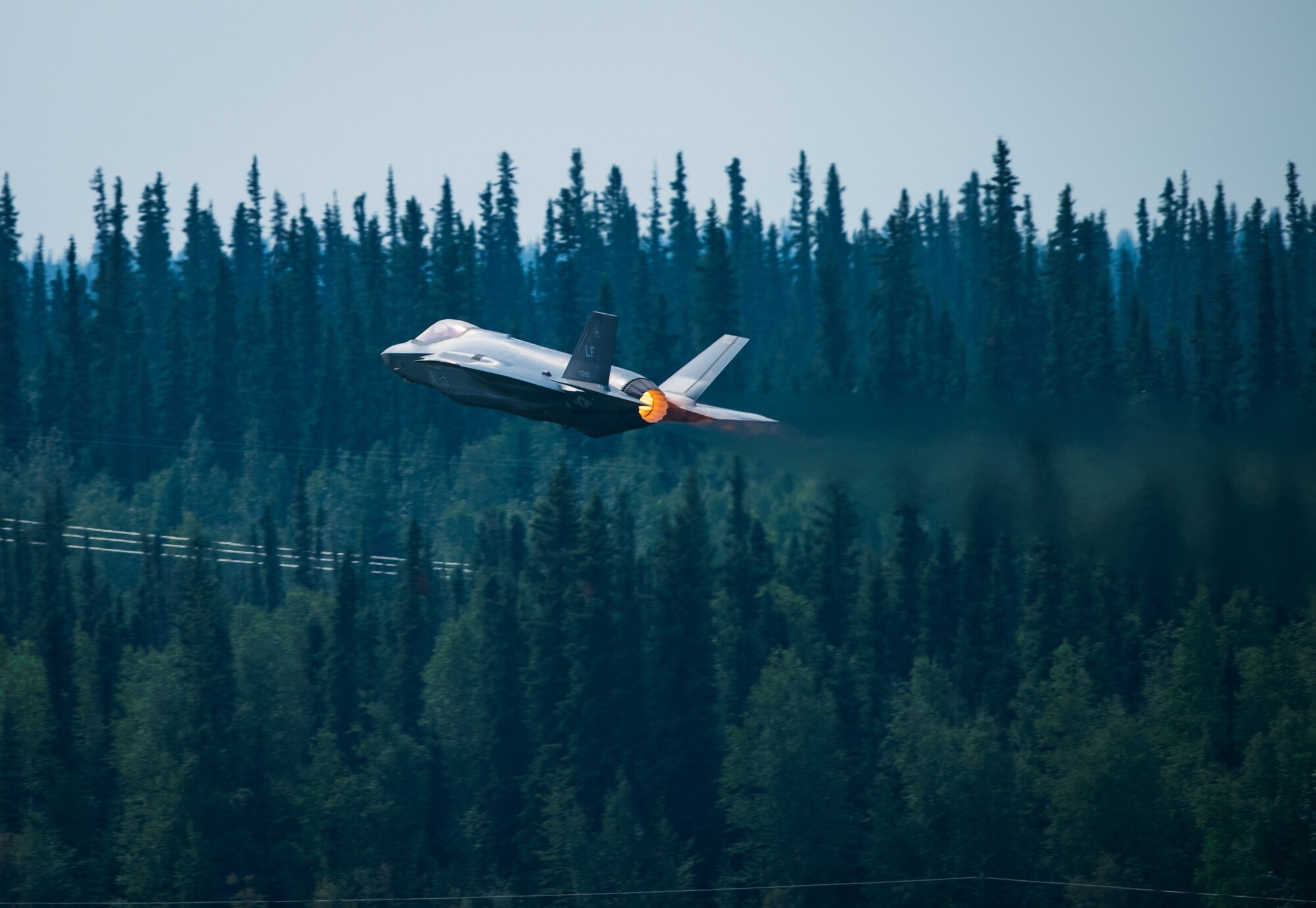Capt. Andrew “Dojo” Olson, F-35 Demonstration Team pilot and commander takes off in an F-35A Lightning II during the Arctic Lightning Airshow July 13, 2019, at Eielson Air Force Base, Alaska. Using all 43,000 pounds of thrust, the F-35 Demonstration begins with a maximum power take off into a vertical climb. (U.S. Air Force photo by Senior Airman Alexander Cook)