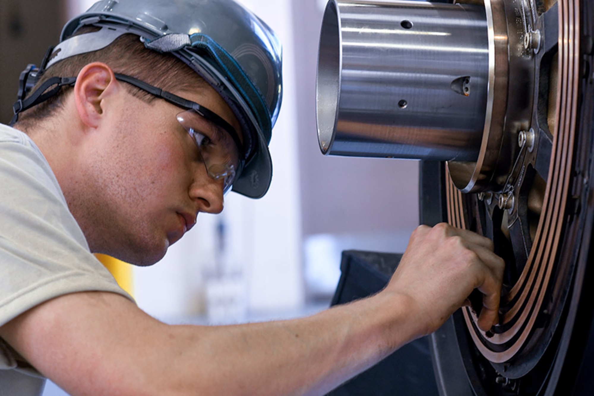 Senior Airman Daniel Phillis, an aerospace propulsion technician from the 910th Aircraft Maintenance Squadron, uses 400-grit sandpaper on a C-130H’s deicer assembly to ensure it is free of corrosion July 15, 2019.