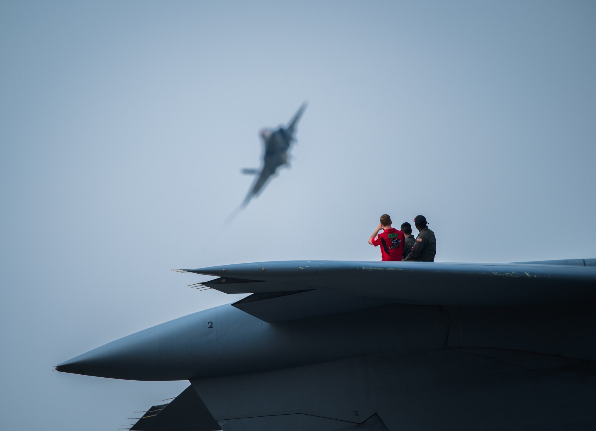Airshow guests watch as Capt. Andrew “Dojo”Olson, F-35 Demonstration Team pilot and commander performs aerial maneuvers in an F-35A Lightning II during the Arctic Lightning Airshow July 13, 2019, at Eielson Air Force Base, Alaska. Spectators got an up-close look at the Air Force’s newest fighter jet marking the airshow since 2008. (U.S. Air Force photo by Senior Airman Alexander Cook)