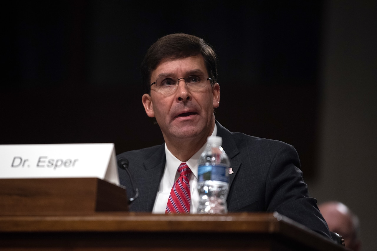 Army Secretary Dr. Mark T. Esper testifies at a hearing.