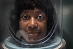 Gennette Jones, a hyperbaric patient, wears an oxygen hood inside a hyperbaric chamber at Brooke Army Medical Center May 31. Typical hyperbaric patients suffer from post-radiation injuries, decompression sickness, arterial gas embolism, chronic wounds, diabetics that have end-organ disease and poor circulation, sensory hearing loss, and burns.