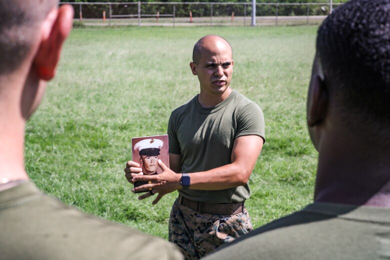 U.S. Marine Corps Gunnery Sgt. Arthur Padilla, an administrative specialist with the installation and personnel administration center, Marine Corps Base Hawaii (MCBH), speaks to his Marines prior to a physical training event, MCBH, July 11, 2019. (U.S. Marine Corps photo by Cpl. Luke Kuennen)
