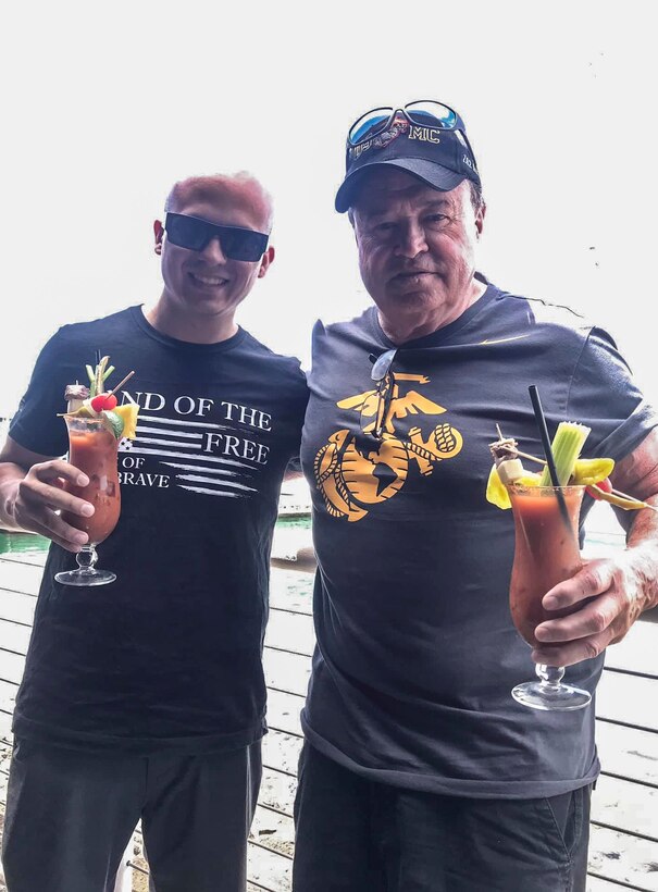 U.S. Marine Corps Gunnery Sgt. Arthur Padilla (left) poses for a photo with his father-in-law Michael J. O'Malley, 2019. (Courtesy photo from Gunnery Sgt. Arthur Padilla)