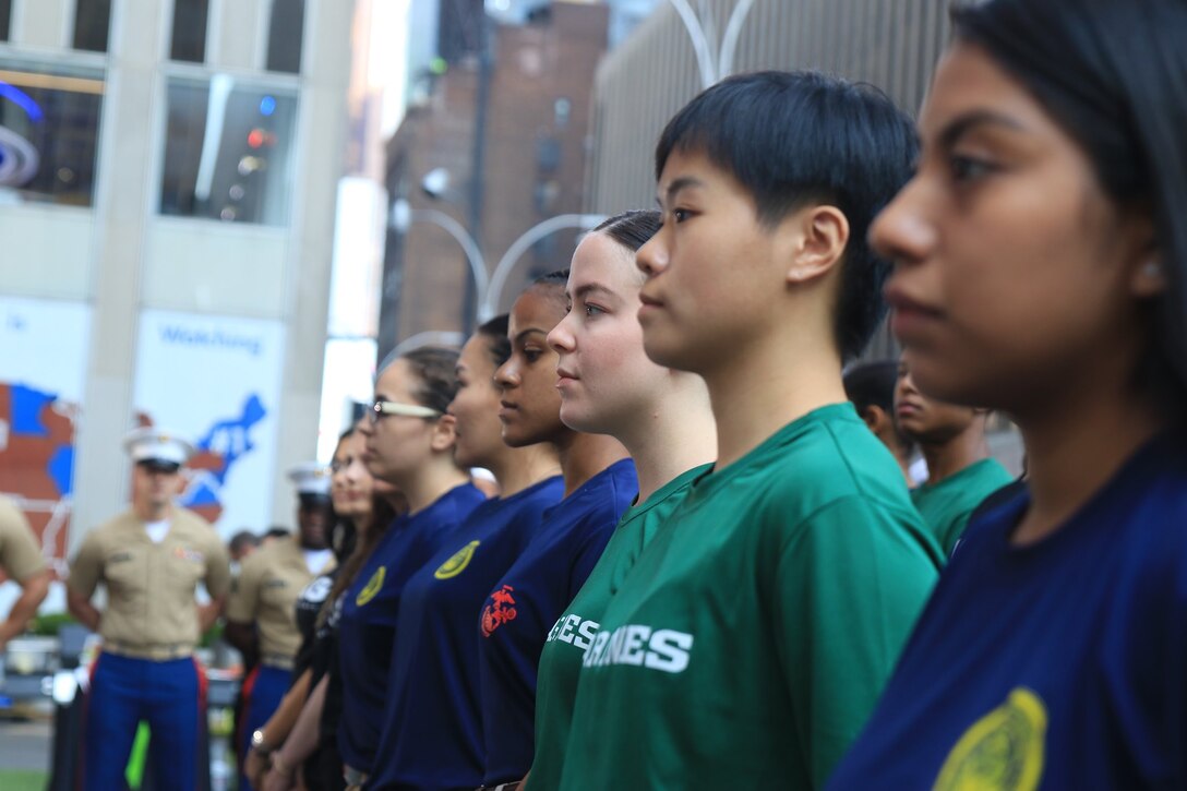 Marine enlistees stand in formation before reciting the Oath of Enlistment during the Fox and Friends morning show as part of Fleet Week in New York, N.Y., May 26, 2019. FWNY is an opportunity for the citizens of New York City and the surrounding tristate area to come together with the nation’s sea services through community engagement to gain a better understanding of how the sea services support the national defense of the United States. (U.S. Marine Corps photo by Sgt. Maverick Mejia)