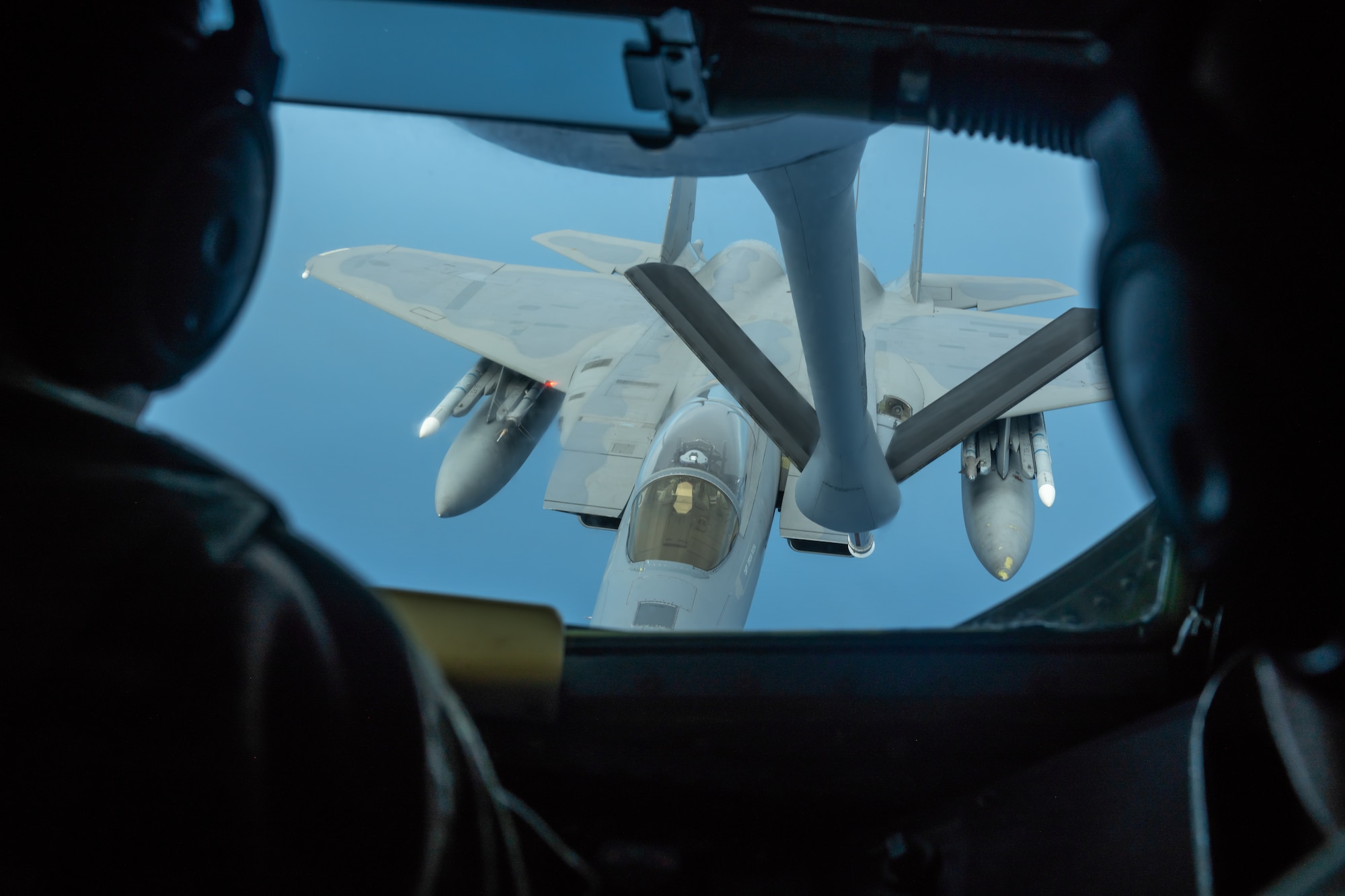 An F-15C Eagle from the 44th Fighter Squadron prepares to refuel with a KC-135 Stratotanker from the 909th Air Refueling Squadron July 10, 2019, during a training exercise out of Kadena Air Base, Japan. The 44th FS at Kadena AB plays a unique role in securing peace and stability in a free-and-open Indo-Pacific. (U.S. Air Force photo by Airman 1st Class Matthew Seefeldt)