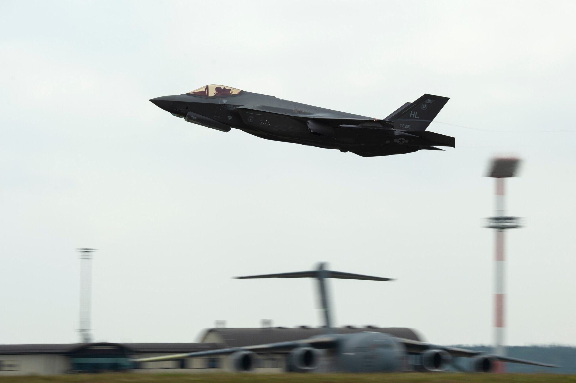 A U.S. Air Force F-35A Lightning II, assigned to the 421st Fighter Squadron, Hill Air Force Base, Utah, takes off during Operation Rapid Forge at Spangdahlem Air Base, Germany, July 16, 2019. Rapid Forge aircraft are forward deploying to train in allied host nations. The operation is in place to assure U.S. allies, respond to threats, and ensure support to global operations. (U.S. Air Force photo by Airman 1st Class Valerie Seelye)