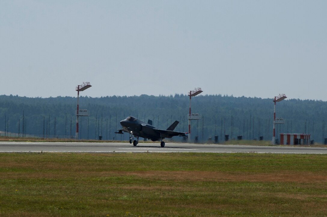 A U.S. Air Force F-35A Lightning II, assigned to the 421st Fighter Squadron, Hill Air Force Base, Utah, lands on the flight line during Operation Rapid Forge at Spangdahlem Air Base, Germany, July 16, 2019. The goal of the operation is to enhance interoperability with NATO allies and partners to improve combined operational capabilities. The F-35A is a multi-role aircraft with technology that provides pilots with unprecedented situational awareness of the battle space. (U.S. Air Force photo by Airman 1st Class Valerie Seelye)