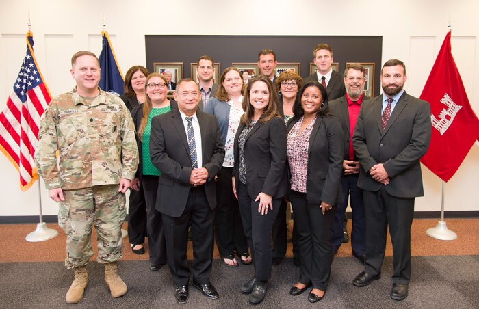 The graduating class of Huntsville Center’s 2018-2019 Leadership Development Program Level II stands with Lt. Col. H. W. Hugh Darville, Huntsville Center commander, June 18, 2019.