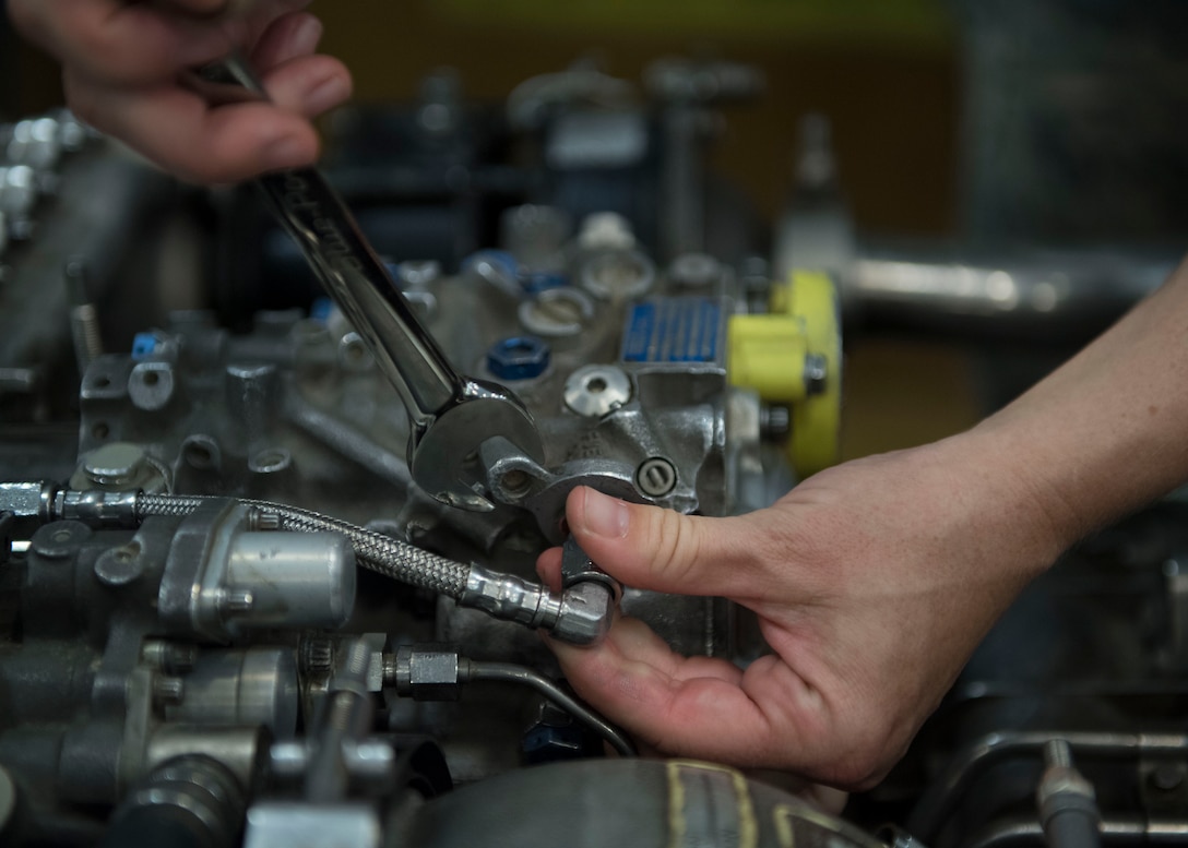 U.S. Air Force Airman 1st Class Natalie Brandt, Detachment 1, 362nd Training Squadron student, adjusts a bolt during a UH-60 Helicopter Repairer course at Joint Base Langley-Eustis, Virginia, July 15, 2019.