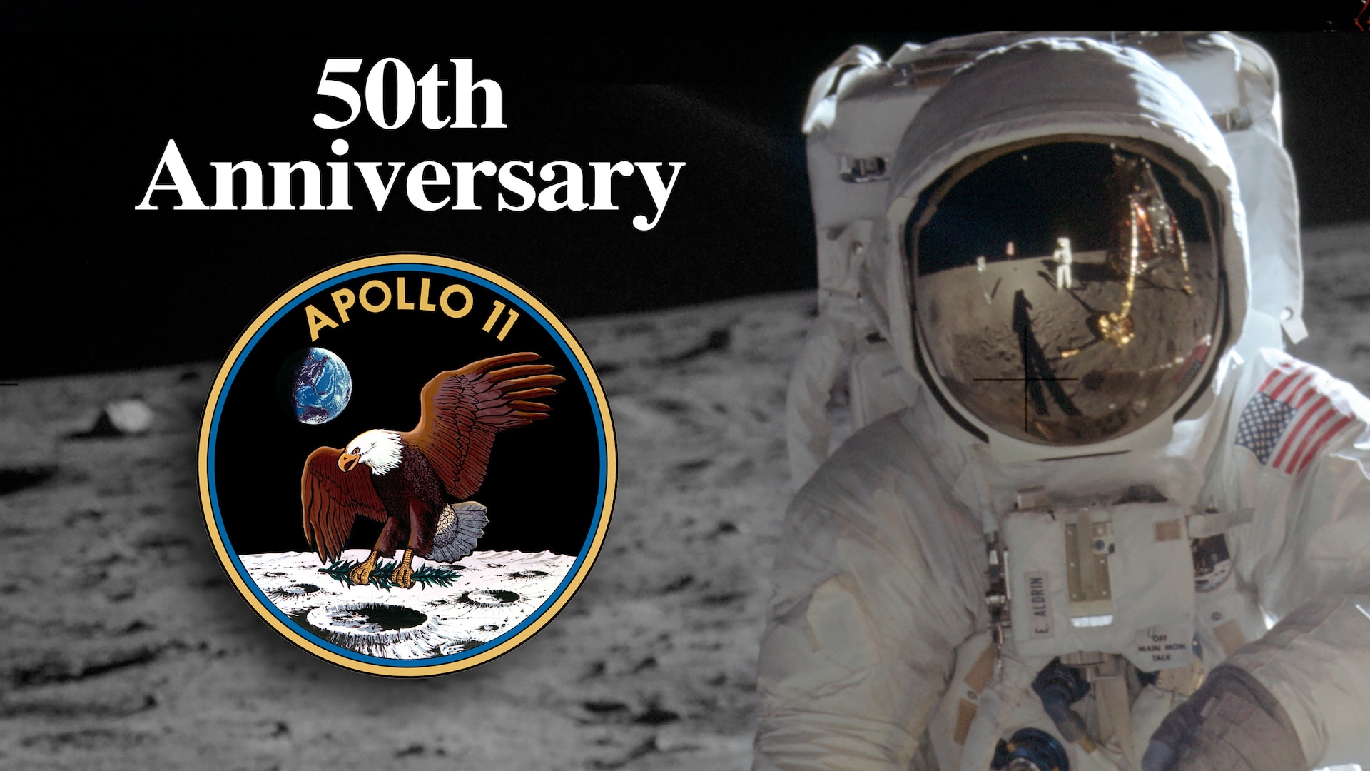 Astronaut Buzz Aldrin stands on the surface of the moon with the leg of the lunar module reflected in his visor. An Apollo II emblem is accompanied by the text 50th Anniversary.