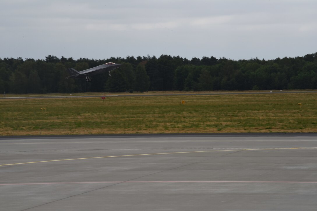 A U.S. Air Force F-35A Lightning II aircraft deployed from the 388th and 419th Fighter Wings, Hill Air Force Base, Utah, takes off during Operation Rapid Forge on Powidz Air Base, Poland, July, 16, 2019. This is the first time that a U.S. Air Force F-35A Lightning II aircraft has landed in Poland. Rapid Forge is a U.S. Air Forces in Europe-led mission to enhance readiness and test the ability to function at locations other than the main air bases.