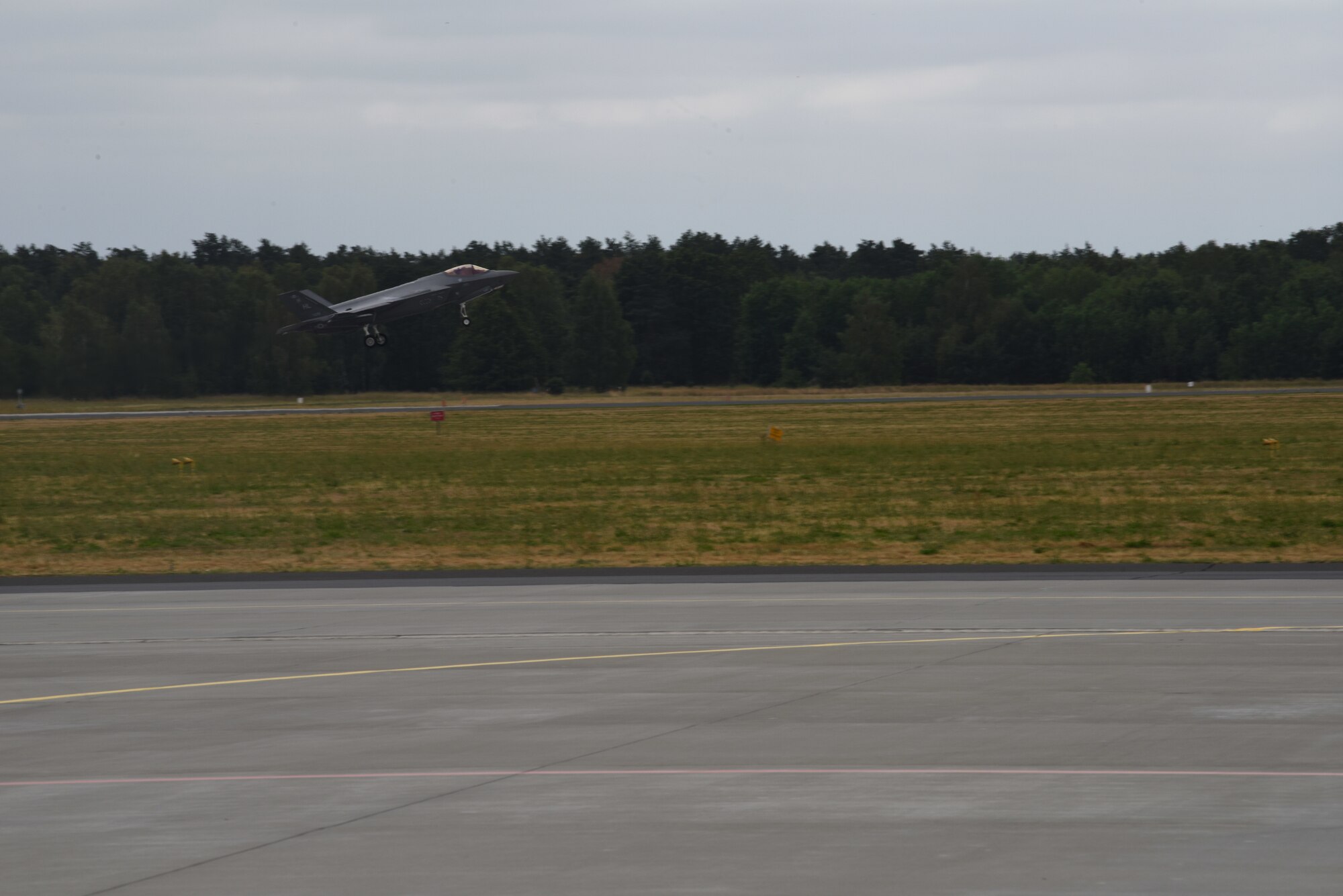 A U.S. Air Force F-35A Lightning II aircraft deployed from the 388th and 419th Fighter Wings, Hill Air Force Base, Utah, takes off during Operation Rapid Forge on Powidz Air Base, Poland, July, 16, 2019. This is the first time that a U.S. Air Force F-35A Lightning II aircraft has landed in Poland. Rapid Forge is a U.S. Air Forces in Europe-led mission to enhance readiness and test the ability to function at locations other than the main air bases.