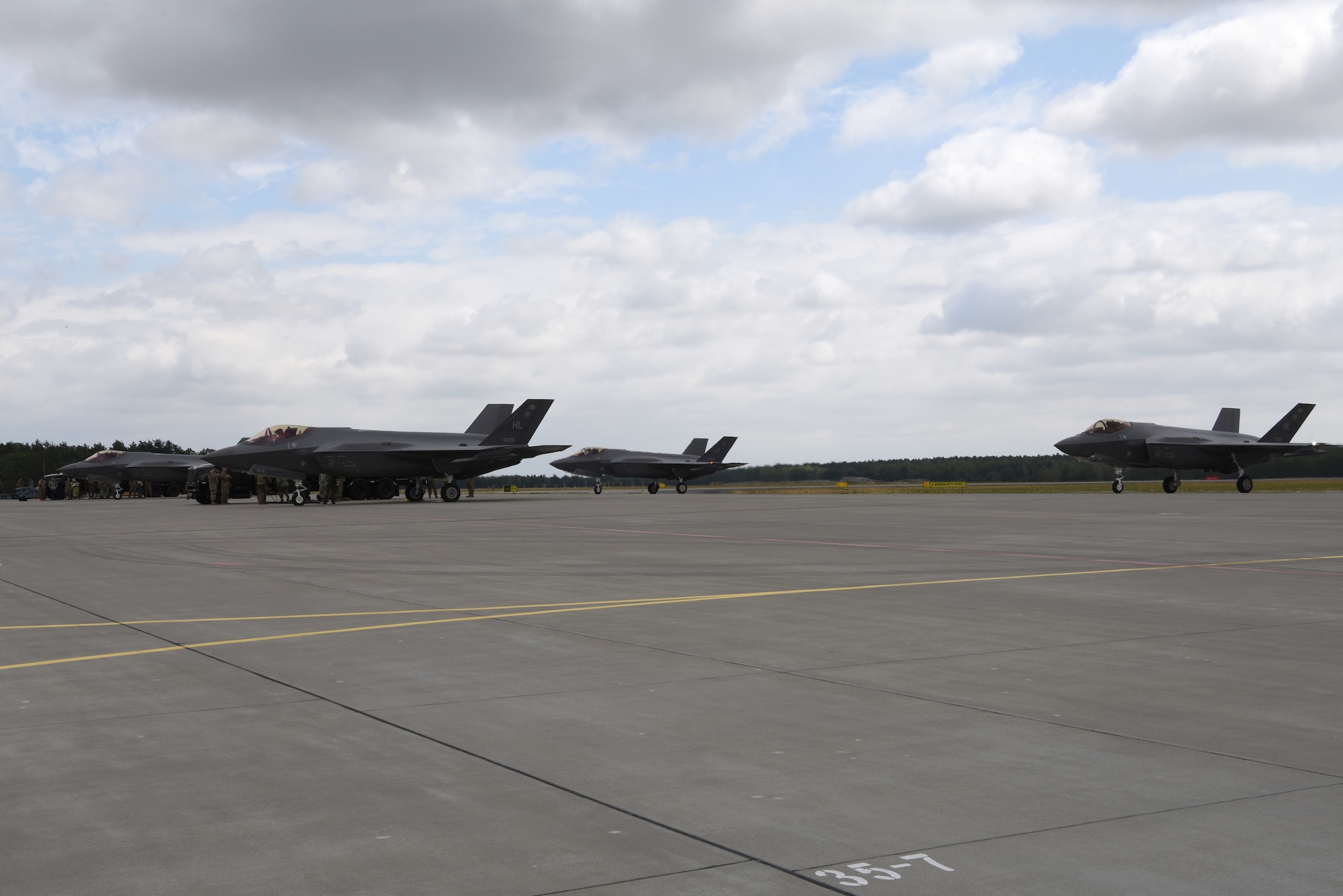 Four U.S. Air Force F-35A Lightning II aircraft deployed from the 388th and 419th Fighter Wings, Hill Air Force Base, Utah, prepare to refuel during Operation Rapid Forge on Powidz Air Base, Poland, July, 16, 2019. This is the first time that U.S. Air Force F-35A Lightning II stealth aircraft have landed in Poland. Operation Rapid Forge is intended to enhance interoperability with NATO allies to improve combined operational capabilities.