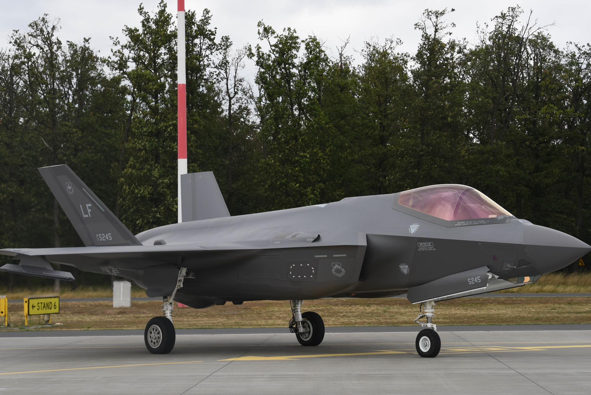 A U.S. Air Force F-35A Lightning II aircraft sits on a runway during Operation Rapid Forge on Powidz Air Base, Poland, July, 16, 2019. This is the first time that an U.S. Air Force F-35A Lightning II aircraft has landed in Poland. Rapid Forge is a U.S. Air Forces in Europe-led mission to enhance readiness and test the ability to function at locations other than the main airbases.