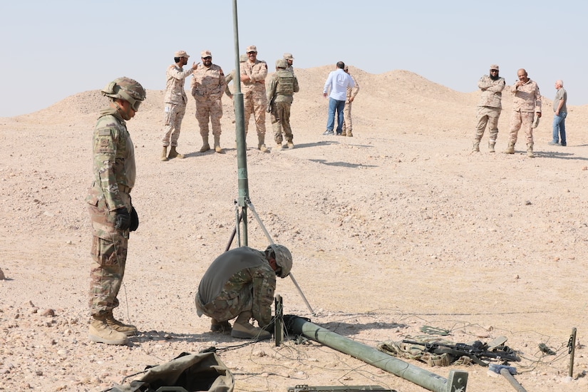 Kuwait Land Forces Soldiers observe as U.S. Soldiers from 588th Brigade Engineer Battalion, 3rd Armored Brigade Combat Team, 4th Infantry Division, perform radio retransmission (RETRANS) training just outside of Camp Buehring, Kuwait on Wednesday, July 10. The U.S. and KLF Soldiers trained together multiple times as part of an ongoing partnership before 588th's RETRANS teams completed their final validation event, which the KLF observed.