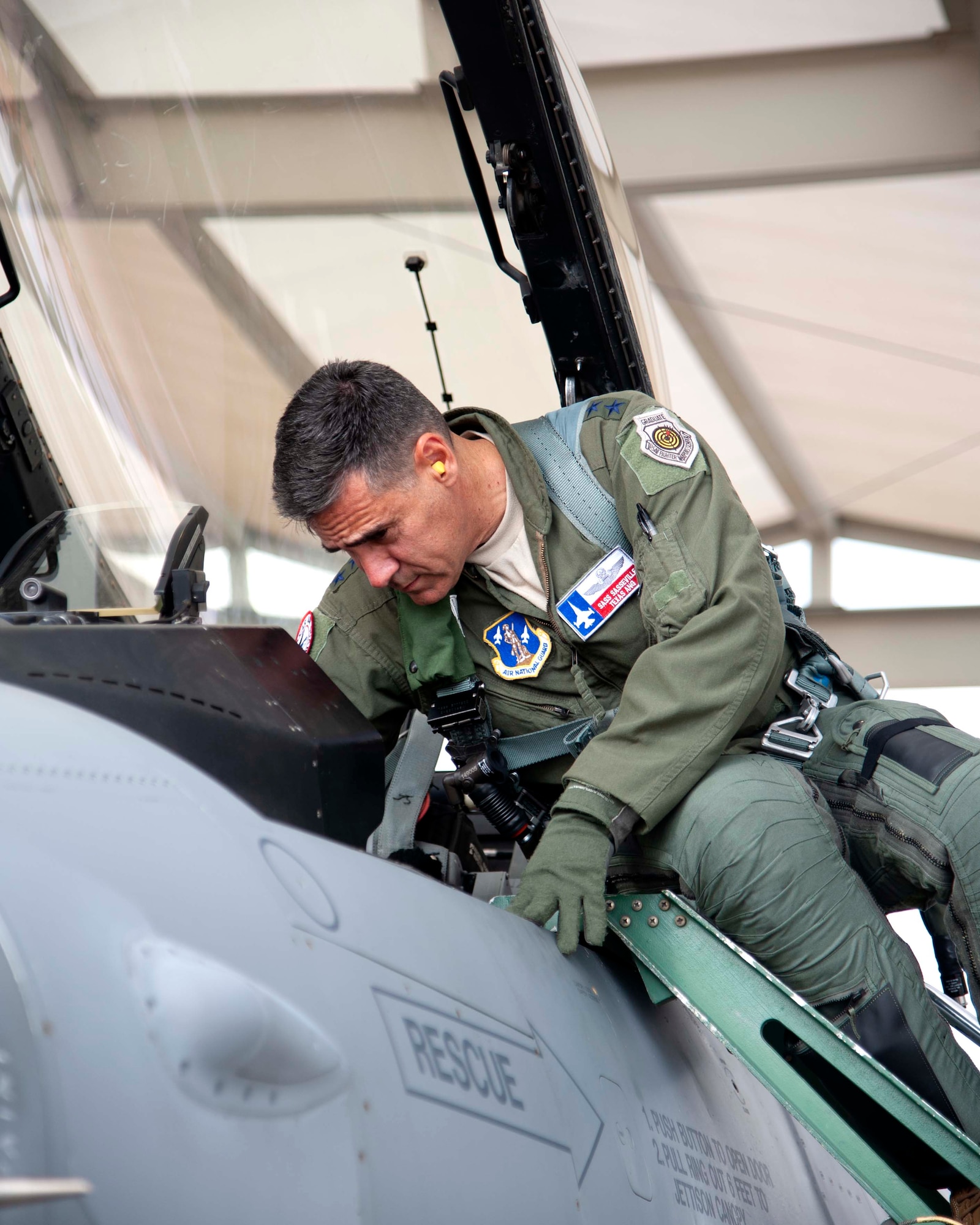 Lt. Gen. Marc Sasseville, Continental U.S. NORAD Region-1st Air Force (Air Forces Northern) Commander, checks out the instrument panel of an F-16 Fighting Falcon, prior to a flight for the F-16 Senior Officer Course, hosted by the 149th Fighter Wing, Joint Base San Antonio, Texas. The four-week course, designed to requalify experienced F-16 fighter pilots, focused on advanced handling characteristics, tactical formation and instrument-flying procedures. He also regained his air-air refueling currency during the course along with flying basic fighter maneuvers. He was required to requalify in the fighter jet based on his roles and responsibilities as the CONR-1 AF (AFNORTH) Commander. (Air Force photo by Capt. Cindy Piccirillo)