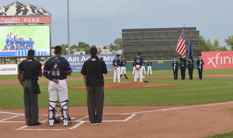 The High Frontier Honor Guard presents the U.S. flag prior to the game between Colorado Springs Rocky Mountain Vibes and Billings Mustangs at UC Health Park in Colorado Springs, Colorado, July 11, 2019.   The Vibes lost 6-1. (U.S. Air Force photo by Staff Sgt. Matthew Coleman-Foster)