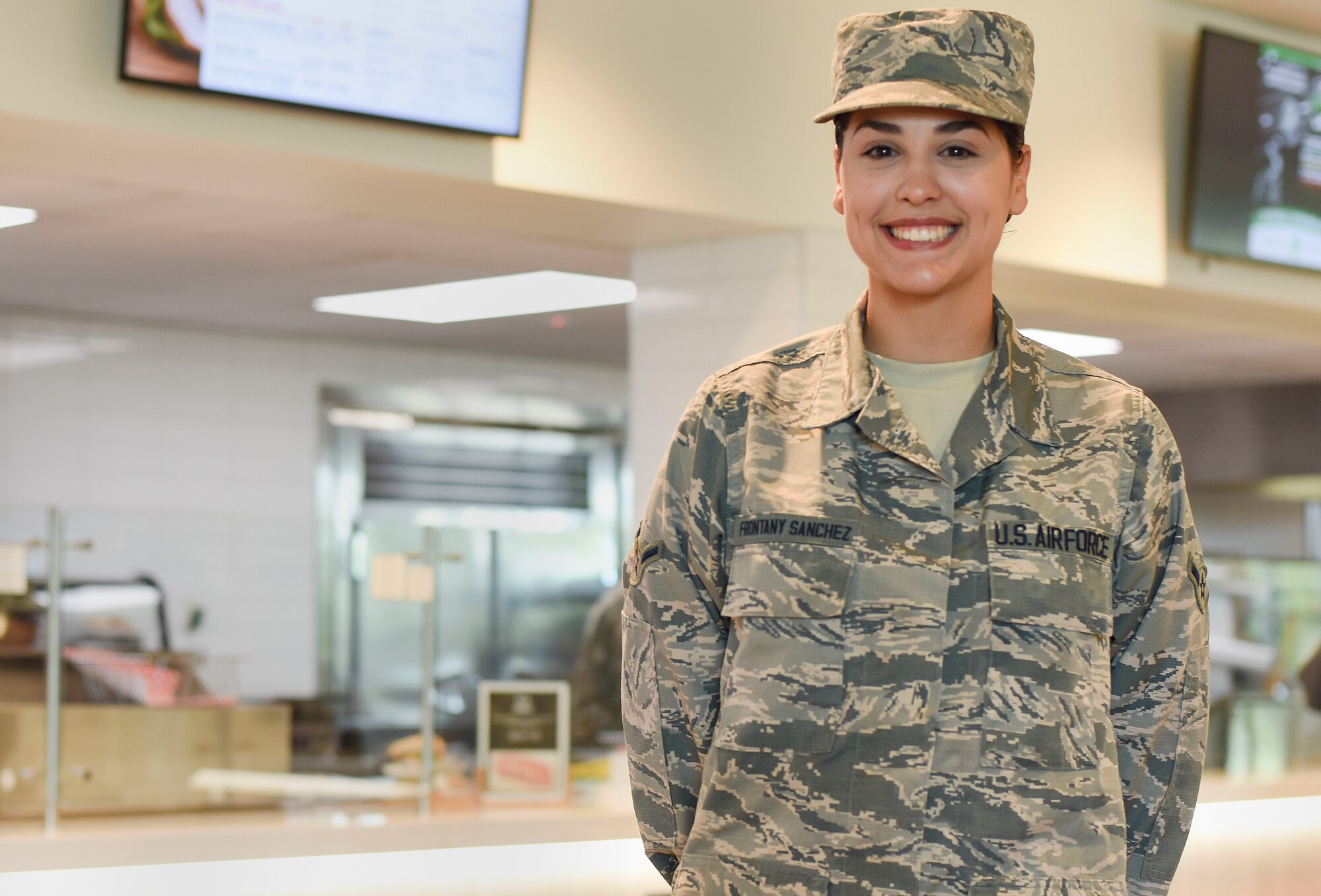 Airman Yolinette Frontany Sanchez, 341st Force Support Squadron food service apprentice, poses for a picture July 16, 2019, at the Elkhorn Dining Facility on Malmstrom Air Force Base, Mont.