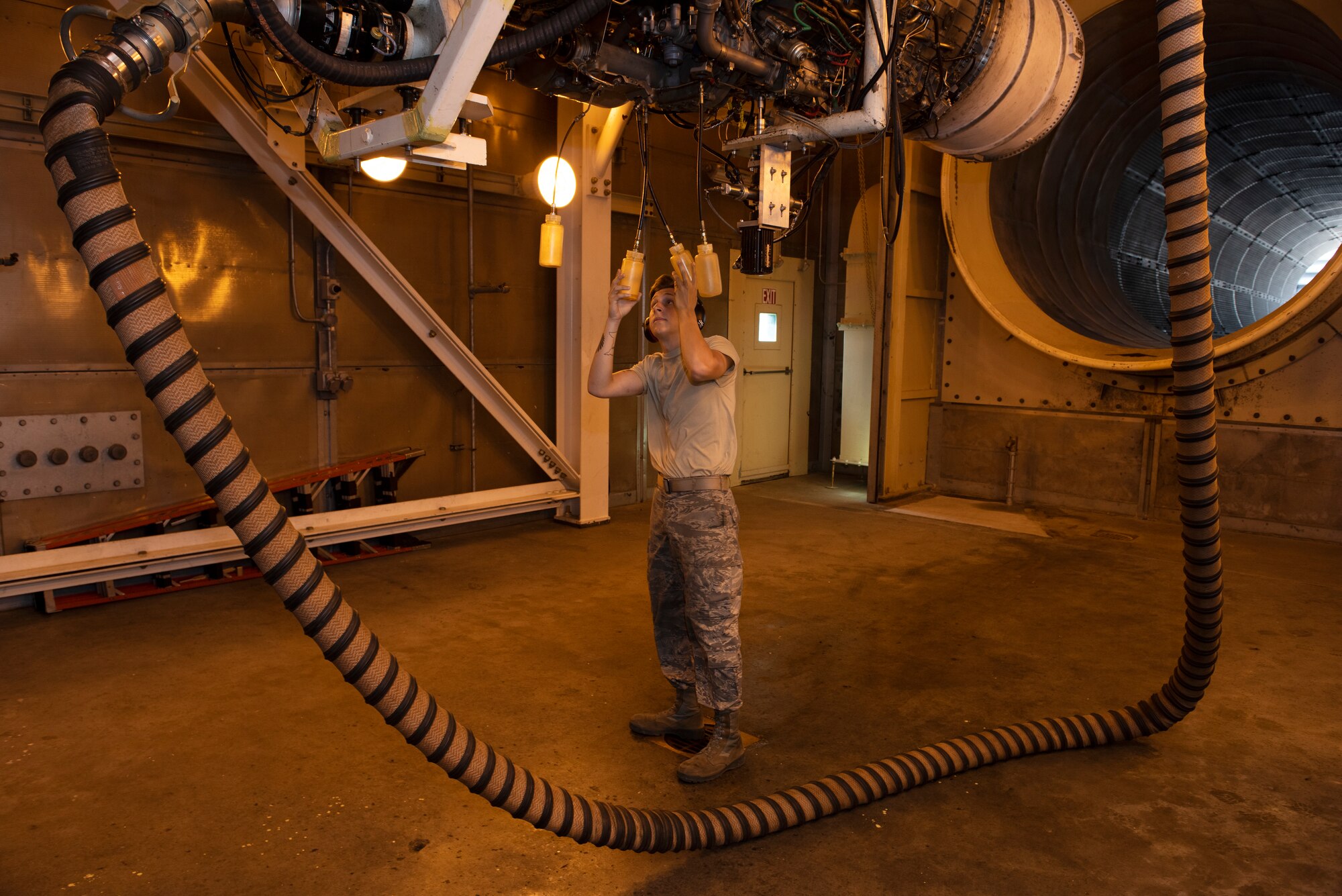 Airman 1st Class Kyle Jacob, an aerospace propulsion Airman assigned the 509th Maintenance Squadron, checks fluid levels on a F-118 engine before diagnostic testing on July 9, 2019, at Whiteman Air Force Base, Missouri. Jacob and other members of the jet propulsion flight work daily to ensure the fleet of B-2 Spirits at Whiteman AFB have the engines needed to accomplish the mission, with plenty to spare, giving Whiteman the highest readiness rate across the active-duty Air Force. (U.S. Air Force photo by Staff Sgt. Kayla White)