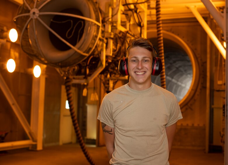 Airman 1st Class Kyle Jacob, an aerospace propulsion Airman assigned the 509th Maintenance Squadron, poses for a portrait on July 9, 2019, at Whiteman Air Force Base, Missouri. Jacob and other members of the jet propulsion flight work daily to ensure the fleet of B-2 Spirits at Whiteman AFB have the engines needed to accomplish the mission, with plenty to spare, giving Whiteman the highest readiness rate across the active-duty Air Force. (U.S. Air Force photo by Staff Sgt. Kayla White)