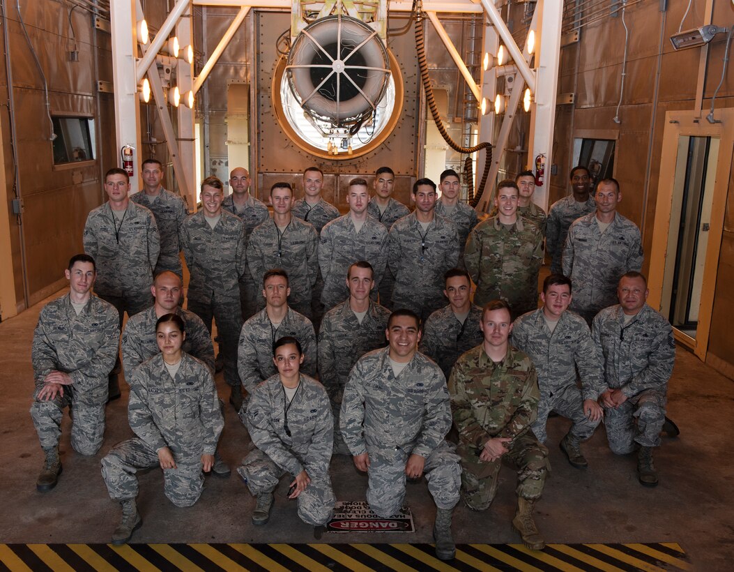 Members of the 509th Maintenance Squadron jet propulsion flight pose for a group photo on July 9, 2019, at Whiteman Air Force Base, Missouri. The jet propulsion flight works daily to run diagnostic tests and perform regular maintenance on F-118 engines, which power the Whiteman AFB fleet of B-2 Spirits. Thanks to their efforts, Whiteman AFB has the highest engine readiness rate across the active-duty Air Force. (U.S. Air Force photo by Staff Sgt. Kayla White)