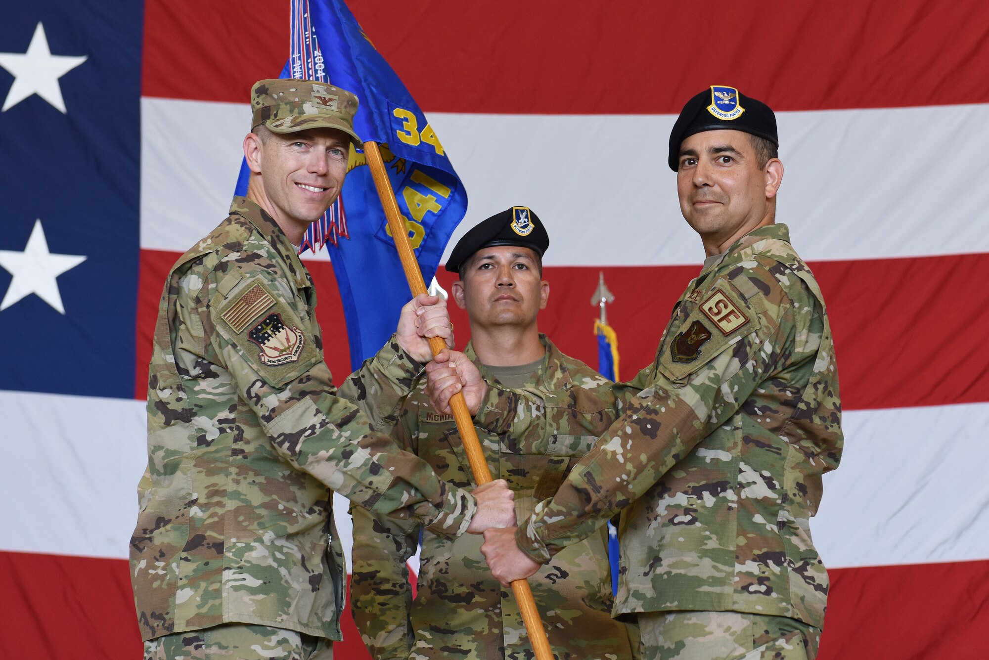 Col. Frank Reyes, right, accepts command of the 341st Security Forces Group from Col. Russell Williford, 341st Missile Wing vice commander during a change of command ceremony July 17, 2019, at Malmstrom Air Force Base, Mont.