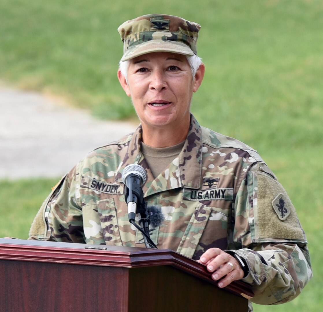 Col. Shauna L. Snyder, outgoing commander Medical Professional Training Brigade, gives remarks at the brigade's change of command ceremony at Joint Base San Antonio-Fort Sam Houston July 16.