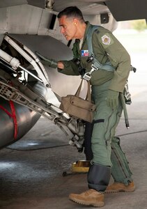 Lt. Gen. Marc Sasseville, Continental U.S. NORAD Region-1st Air Force (Air Forces Northern) Commander, looks over the landing gear during a pre-flight walk-around on an F-16 Fighting Falcon prior to a flight for the F-16 Senior Officer Course, hosted by the 149th Fighter Wing at Joint Base San Antonio-Lackland. The four-week course, designed to requalify experienced F-16 fighter pilots, focused on advanced handling characteristics, tactical formation and instrument-flying procedures. He also regained his air-air refueling currency during the course along with flying basic fighter maneuvers. He was required to requalify in the fighter jet based on his roles and responsibilities as the CONR-1 AF (AFNORTH) commander.