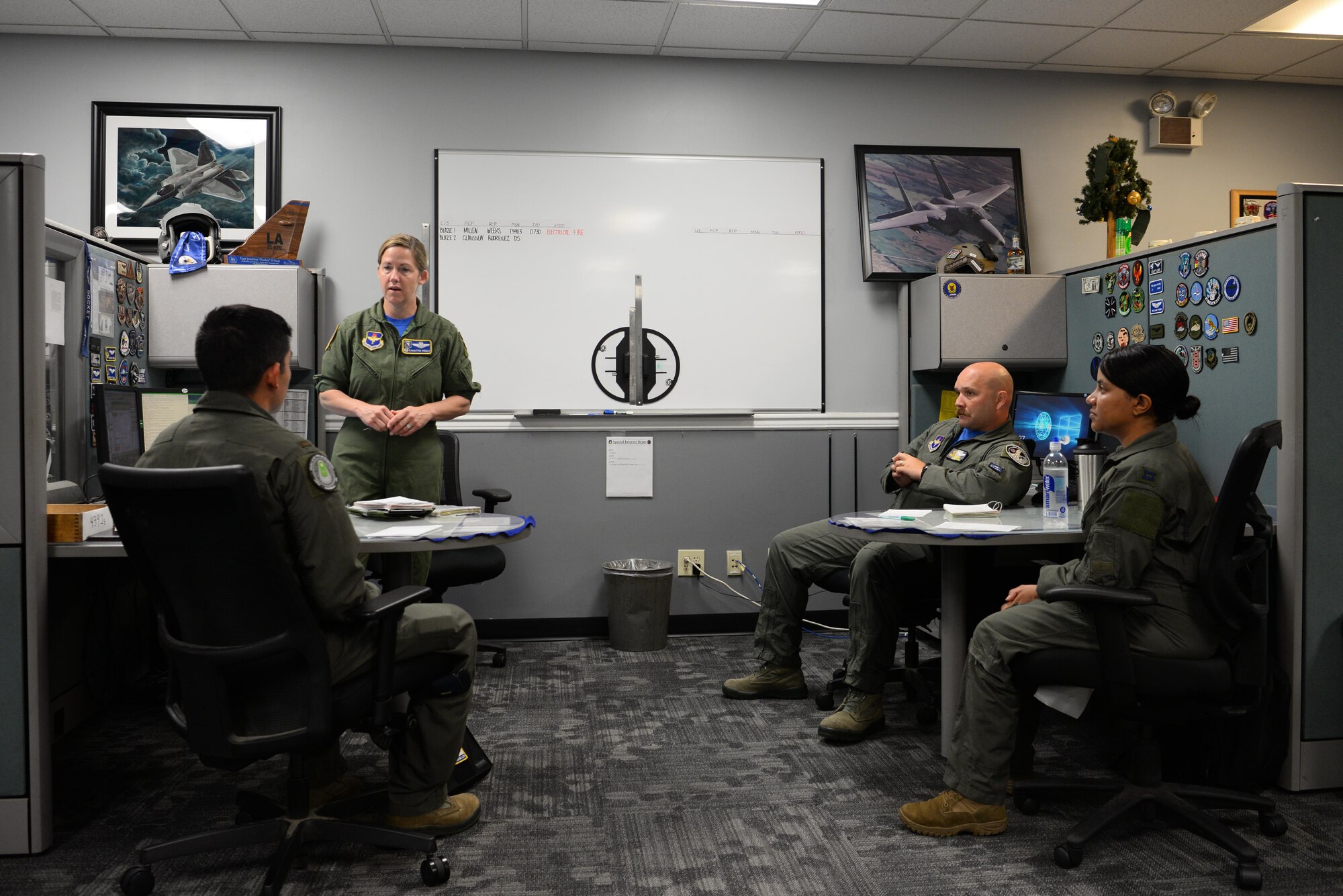 Col. Samantha Weeks, 14th Flying Training Wing commander, speaks to a group of Air force officers, July 12, 2019, on Columbus Air Force Base, Mississippi. Col Weeks invited Maj. Rodriguez to Columbus AFB to fly trainer aircraft and get an idea of what women are dealing with while flying the aircrafts.