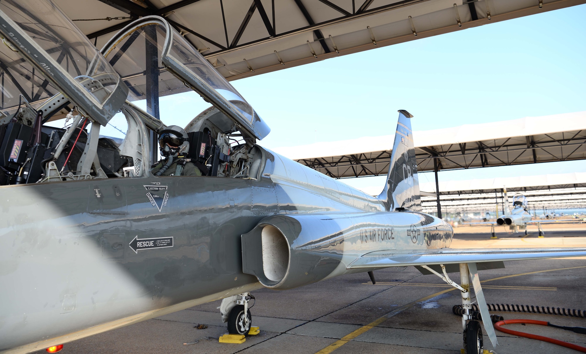 Maj. Saily Rodriguez, the Human Systems Program Office female fitment program manager, sits inside a T-38 Talon, July 12, 2019, on Columbus Air Force Base, Mississippi. Rodriguez visited Columbus AFB to see what the pilots experience when they have their first real exposure into the flying world.
