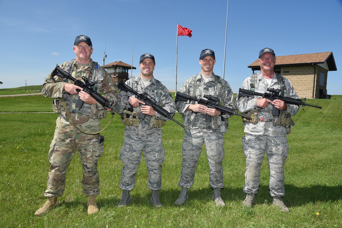 119th Wing Bravo Team from left to right Senior Master Sgt. Wade Swenson, Senior Airman Victor Schleppenbach, Staff Sgt. Steven Smith and Senior Master Sgt. Brian Rook at the 2019 Adjutant General's Combat Marksmanship Match at the Camp Grafton firing complex, near McHenry, North Dakota. They are the third place team in the aggregate score for the annual North Dakota National Guard shooting competition.