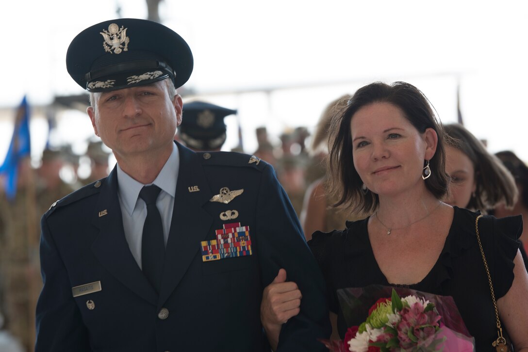 Col. Robert A. Masaitis, incoming 27th Special Operations Wing commander, departs the change of command ceremony with his spouse, Julie, July 17, 2019, at Cannon Air Force Base, N.M. Col. Robert Masaitis took command from the outgoing commander, Col. Stewart Hammons. (U.S. Air Force photo by Senior Airman Vernon R. Walter III)