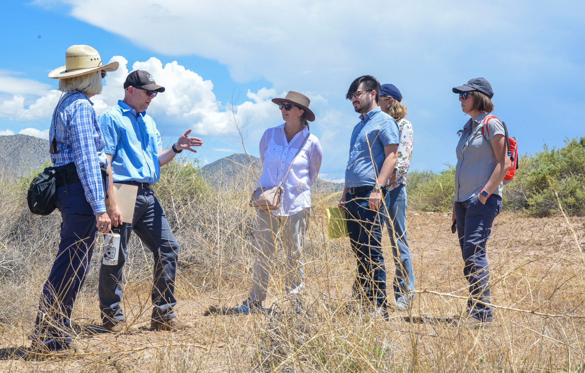 KIRTLAND AIR FORCE BASE, N.M. – (Left to Right) Kate Lynnes and Scott Clark, with Kirtland’s Bulk Fuels Facility remediation project; Bernalillo County Commissioner (District 5) Charlene Pyskoty, staffer Joe Noriega; and Albuquerque Bernalillo County Water Utility Authority’s Diane Agnew and Kate Mendoza take a tour of the Tijeras Arroyo here July 16, 2019. The visitors were given an orientation on pumping treated water into the Kirtland golf course pond for irrigation and stratigraphy along the arroyo as it winds through the installation. (U.S. Air Force photo by Jim Fisher)