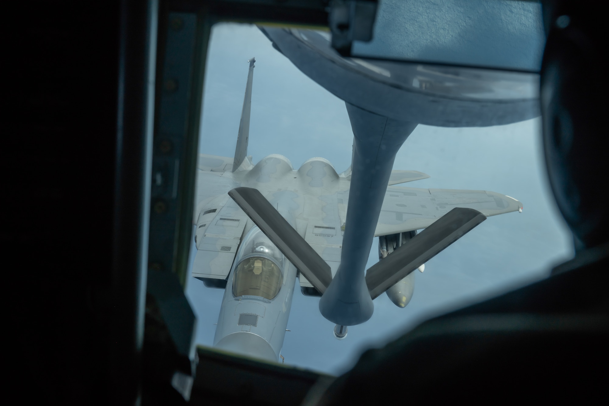 An F-15C Eagle from the 44th Fighter Squadron prepares to refuel with a KC-135 Stratotanker from the 909th Air Refueling Squadron July 10, 2019, during a training exercise out of Kadena Air Base, Japan. The F-15 Eagle is an all-weather, maneuverable, tactical fighter designed to permit the Air Force to gain and maintain air supremacy over the battlefield. (U.S. Air Force photo by Airman 1st Class Matthew Seefeldt)