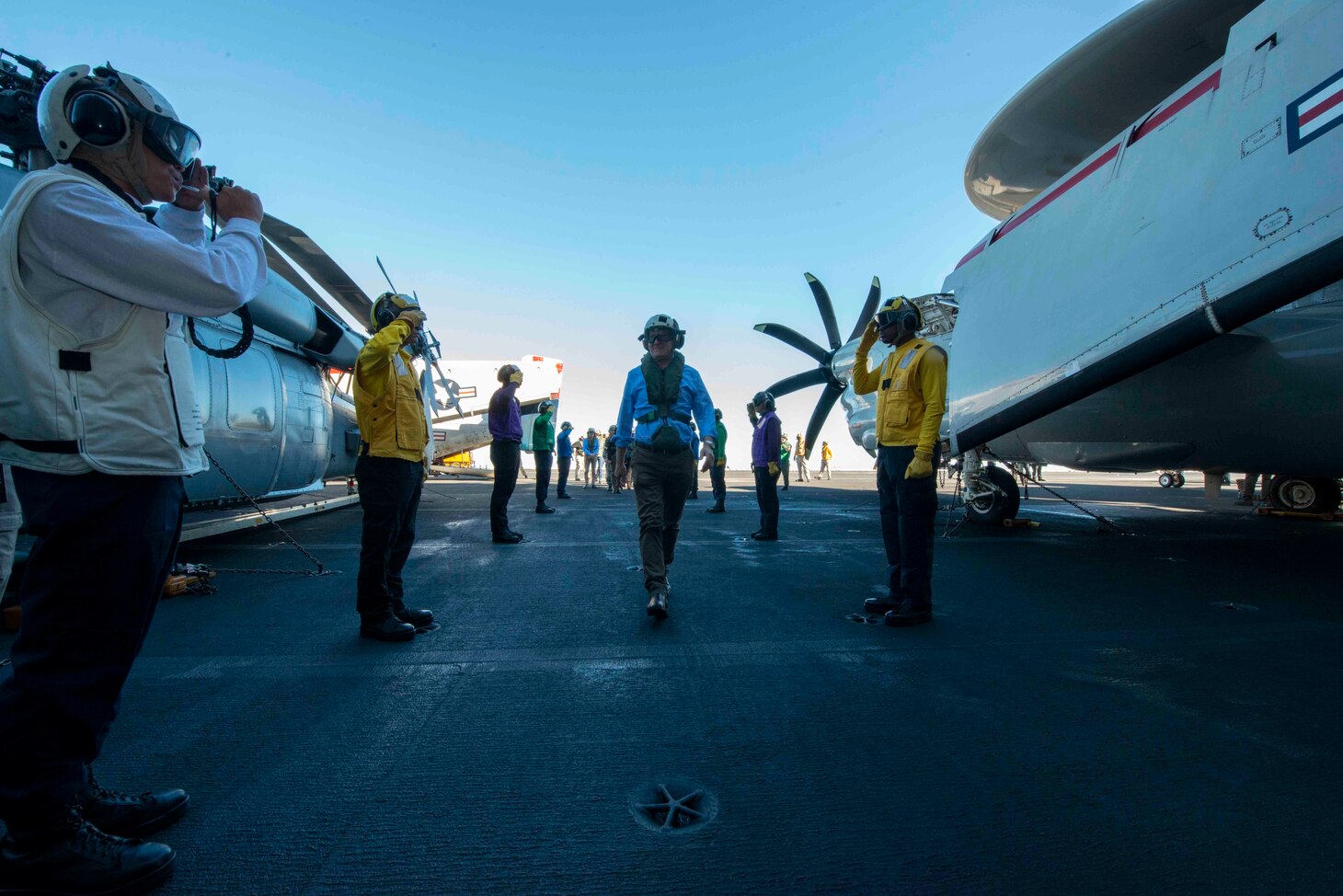 CORAL SEA (July 17, 2019) Deputy Prime Minister Michael McCormack, deputy prime minister of Australia, walks through sideboys on the flight deck aboard the Navy’s forward-deployed aircraft carrier USS Ronald Reagan (CVN 76) during Talisman Sabre 2019. McCormack was among a group of dignitaries including the Honorable Sharon Hudson Dean, U.S. Consul General and Vice Adm. Michael Noonan, Chief of the Australian Navy who were given a tour of the hangar bay and flight deck control before observing flight operations. Talisman Sabre 2019 illustrates the closeness of the Australian and U.S. alliance and the strength of the military-to-military relationship. This is the eighth iteration of this exercise.