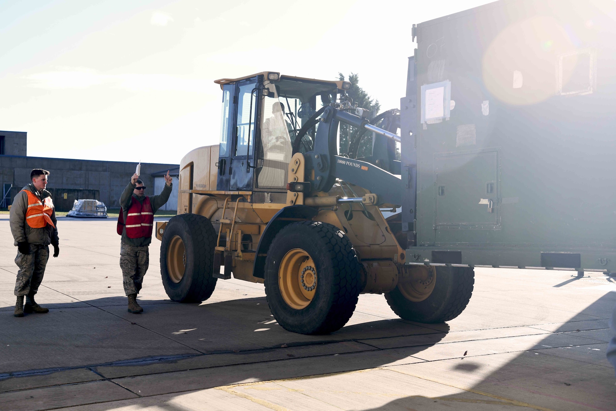 48th Deployment and Distribution Flight Airmen move at Royal Air Force Lakenheath, England, January 16, 2019.  The flight provides Airmen with all necessary equipment to expediently deploy forward and ready, ensuring they can execute their mission. (U.S. Air Force photo by Airman 1st Class Shanice Williams-Jones)