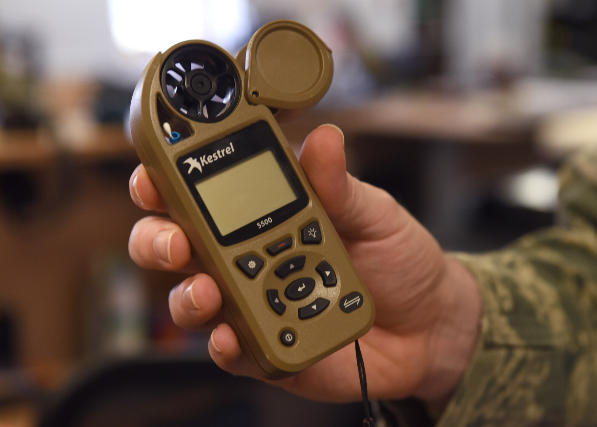 A 48th Operations Support Squadron Airman demonstrates the use of a Kestrel Weather and Wind Speed Meter at Royal Air Force Lakenheath, England, June 26, 2019. The portable meter provides meteorological data to the user. (U.S. Air Force photo by Airman 1st Class Rhonda Smith)