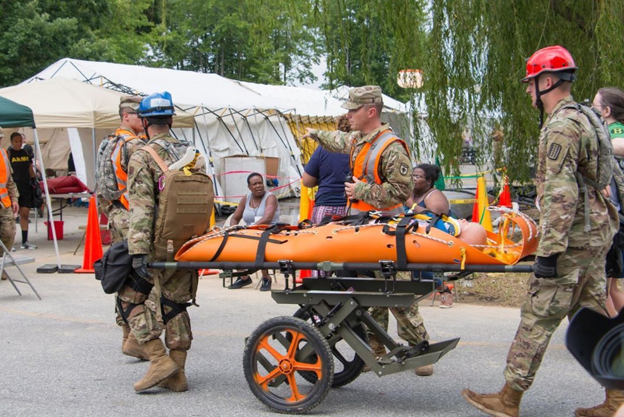 Members of the Delaware National Guard participate in Operation HIGHBALL, July 12, 2019 in New Castle, Del. The exercise provides realistic joint training and evaluation opportunities for both the Army and Air National Guard Drill Status Guardsmen in units that may be called upon to support civilian authorities at the tactical and operational level in a domestic operation. (U.S. National Guard Photo by Mr. Bernie Kale)