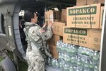A Puerto Rico National Guard soldier prepares to transport food and water to the municipality of Jayuya, Puerto Rico after Hurricane Maria hit, September 27, 2017. DLA Troop Support’s Subsistence supply chain partnered with FEMA to provide more nutritious meals in preparation for the upcoming hurricane season. (U.S. Army National Guard photo by Sgt. Jose Ahiram Diaz-Ramos)