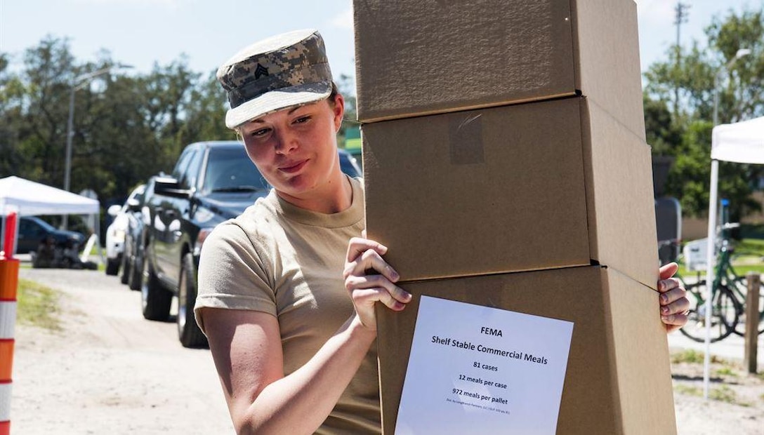 A Puerto Rico National Guard soldier prepares to transport food and water to the municipality of Jayuya, Puerto Rico after Hurricane Maria hit, September 27, 2017. DLA Troop Support’s Subsistence supply chain partnered with FEMA to provide more nutritious meals in preparation for the upcoming hurricane season. (U.S. Army National Guard photo by Sgt. Jose Ahiram Diaz-Ramos)