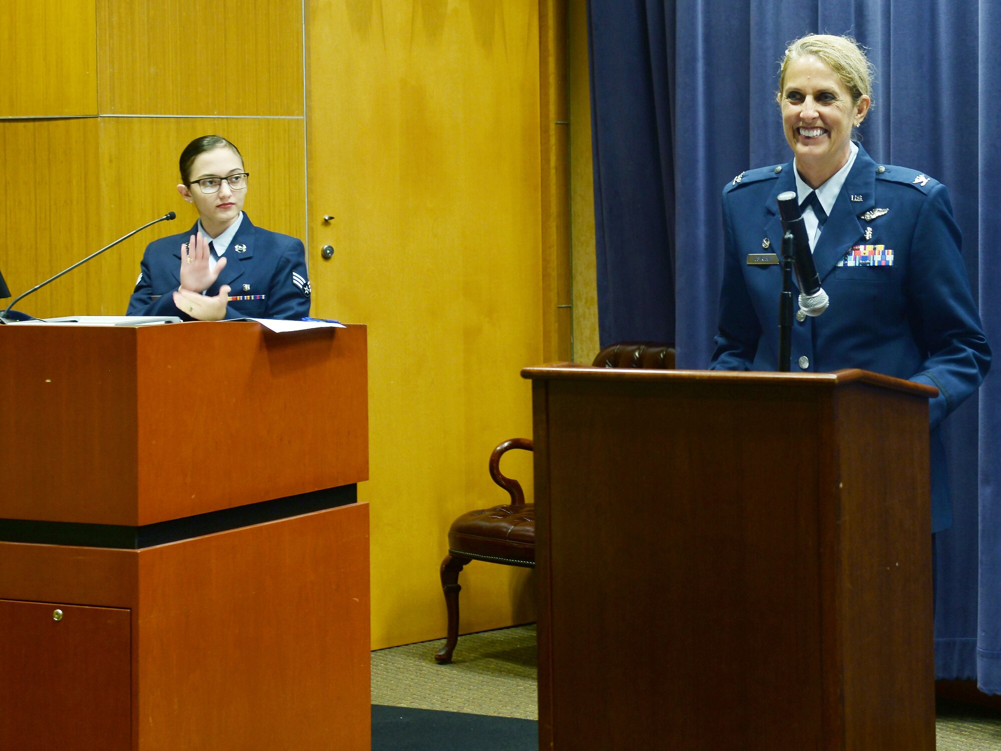 Col. Julie Ostrand, 55th Medical Group commander, gives her first speech as the new commander July  11, 2019, during the 55th Medical Group Change of Command ceremony inside the 5575h Weather Wing auditorium at Offutt Air Force Base, Nebraska. Ostrand is coming in from the 5th Medical Group at Minot AFB, North Dakota.