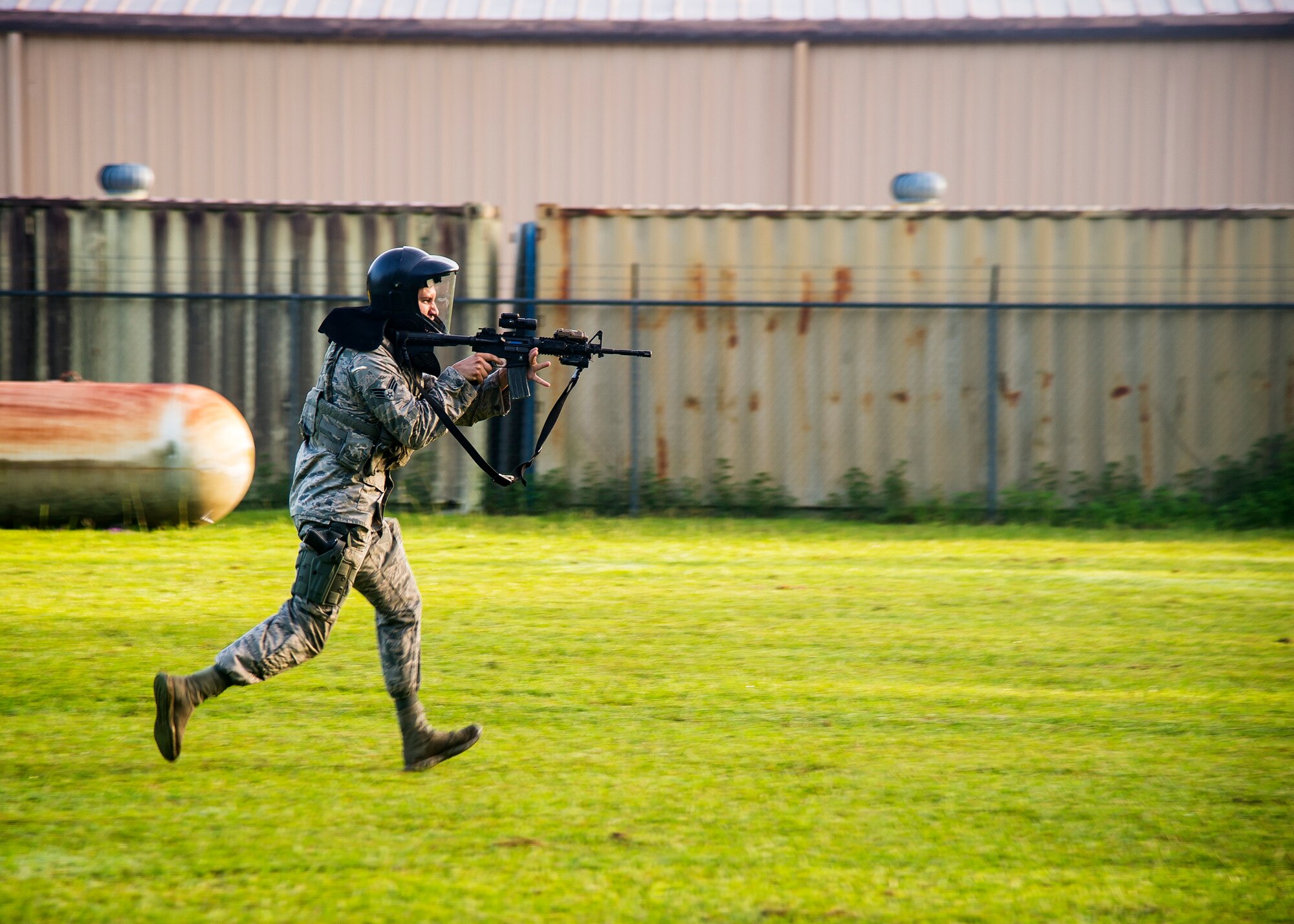 Senior Airman Kyle Mcintyre, 23d Security Forces Squadron patrolman, advances his positon during a training exercise, July 15, 2019, at Moody Air Force Base, Ga. The “Shoot, move, communicate” training exercise put participants through practice maneuvers taking turns providing cover fire while others advanced on the enemy. Airmen learned how to shoot, move and communicate to build confidence in themselves, their wingmen and with their weapons. (U.S. Air Force photo by Airman Azaria E. Foster)