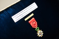 Military decoration on a blue background.