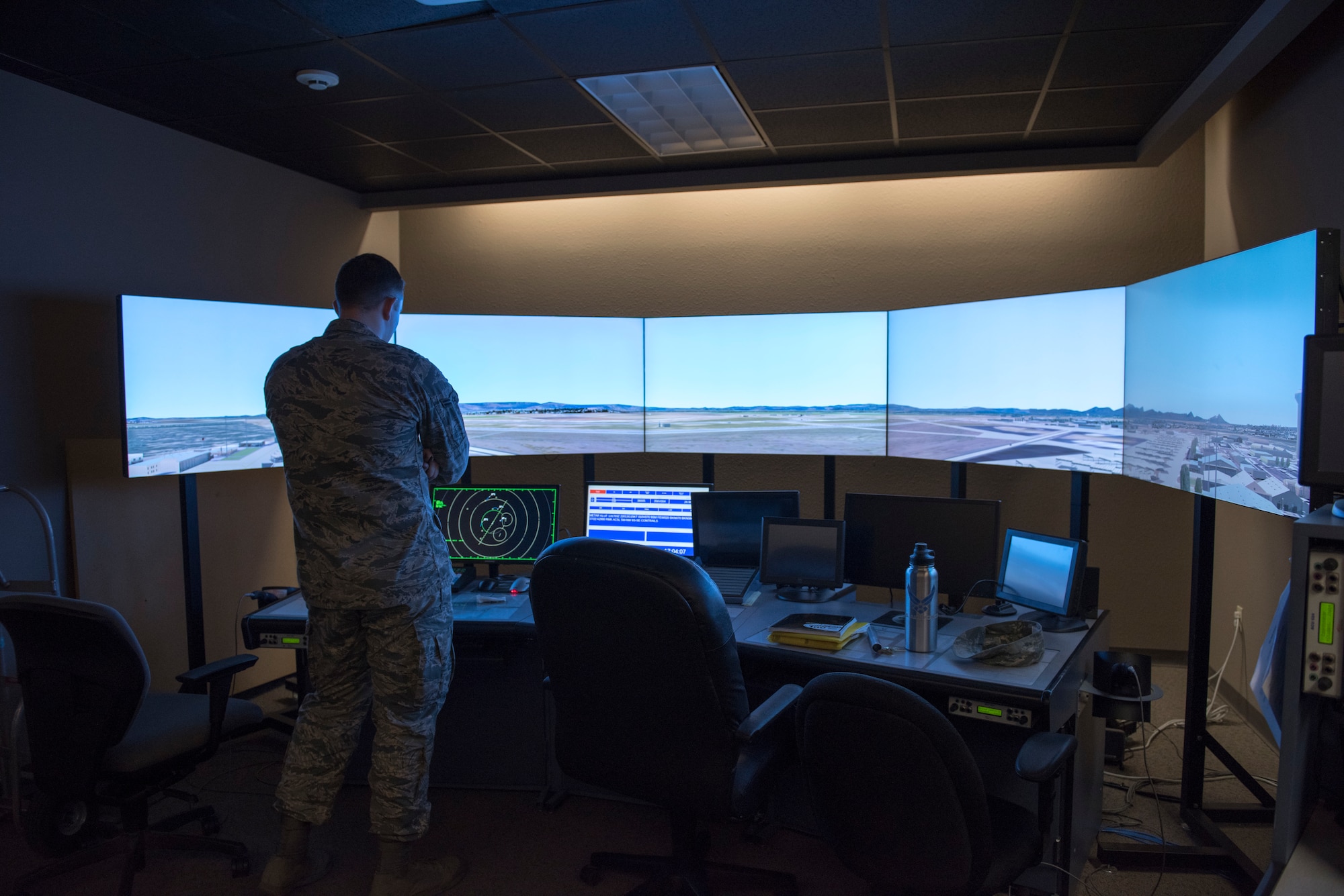 Airman 1st Class Richard Haselden, 56th Operation Support Squadron air traffic controller, uses a computer system to do aircraft simulation training July 15, 2019, at Luke Air Force Base, Ariz.