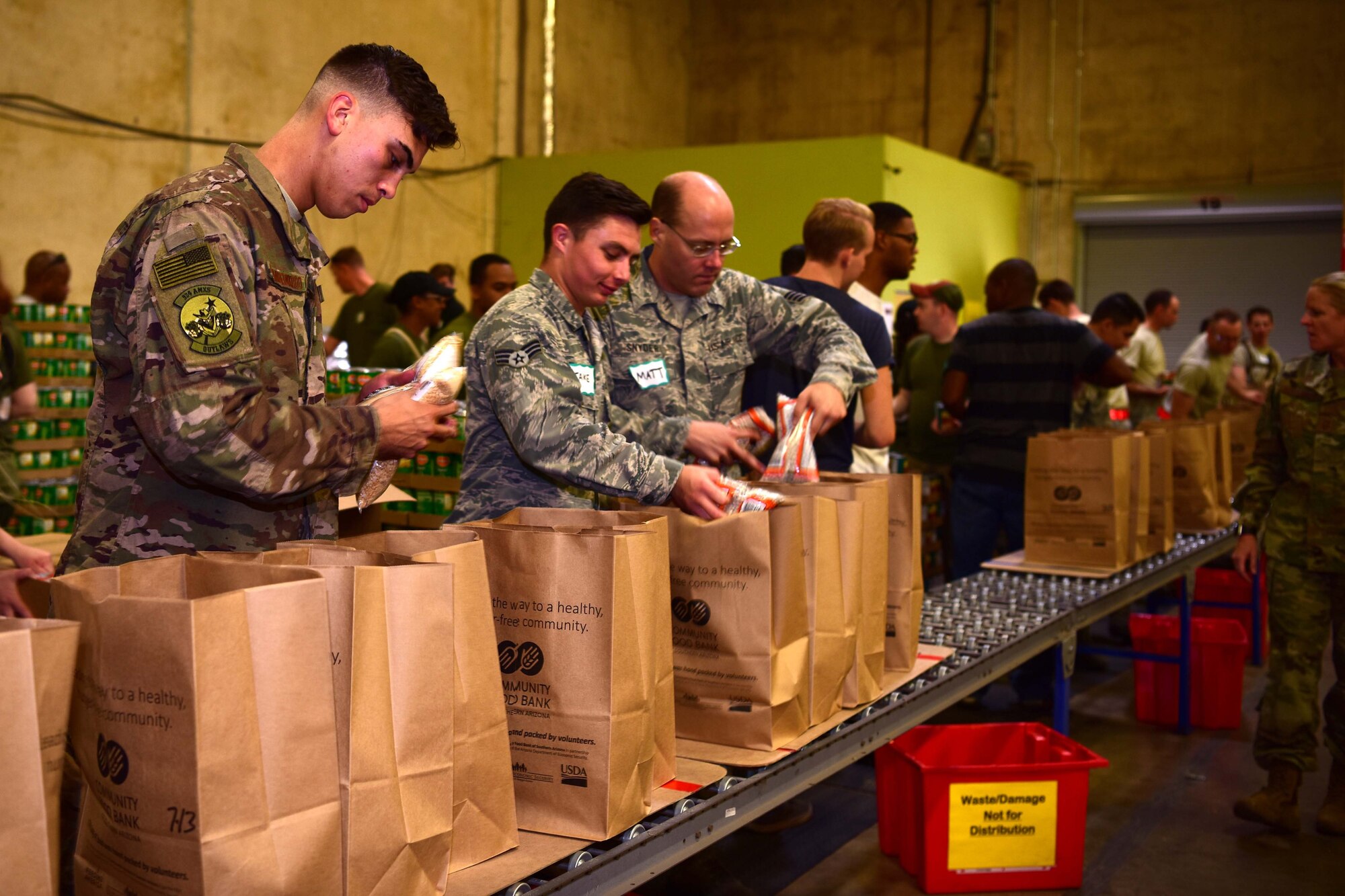 The reservists spent their Saturday morning supporting the needy, spanning five counties by building 3,360 food boxes at the Community Food Bank of Southern Arizona.